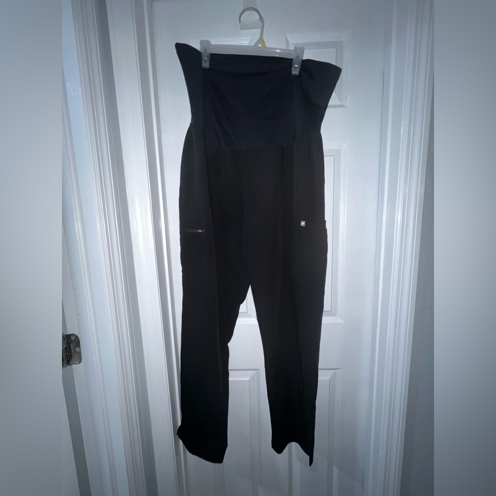 Black women’s maternity scrub pants. Figs brand.